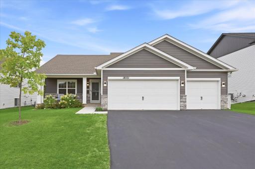 Welcome home! This thoughtfully designed home offers five bedrooms, four bathrooms, and a three-car garage.