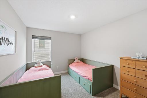 Upper level bedroom #3 with walk in closet.