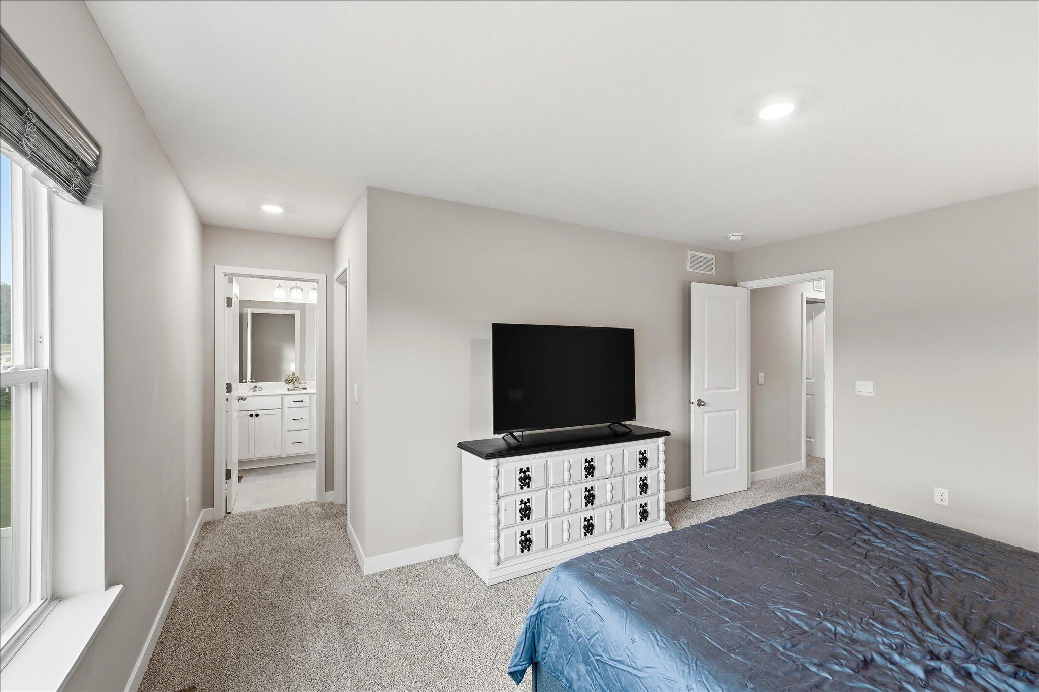 A comfortable primary suite designed with everyday convenience in mind.