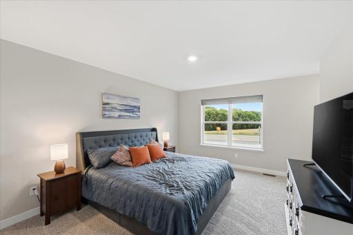 Your own private retreat! The primary bedroom features a walk-in closet and private full bathroom.