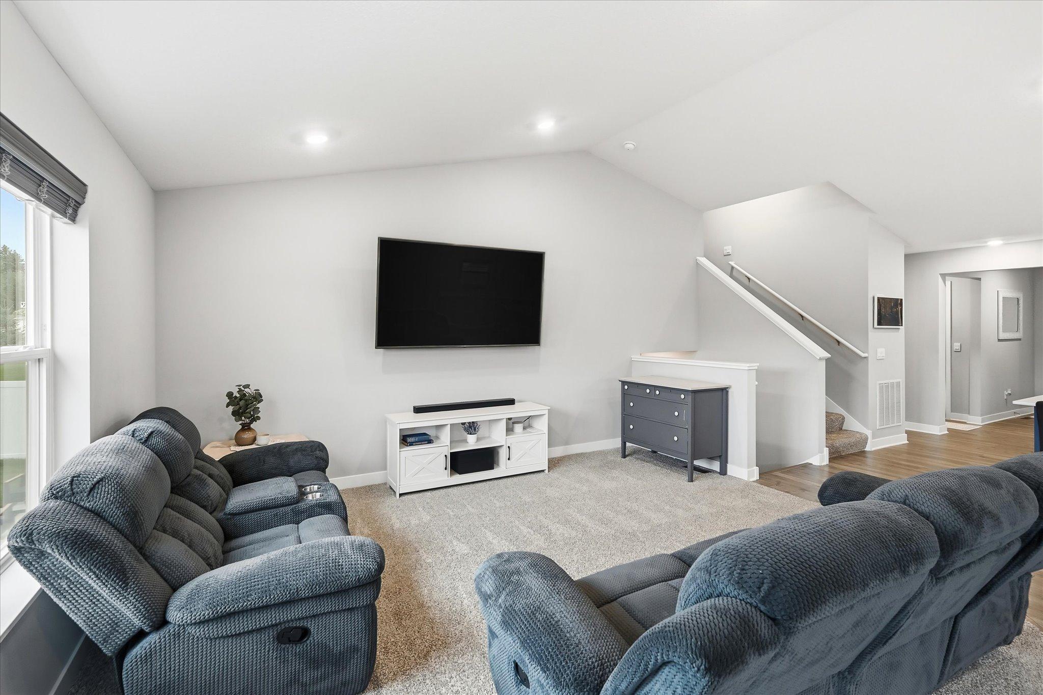 Step inside and enjoy the bright, open feel of the vaulted main living area.