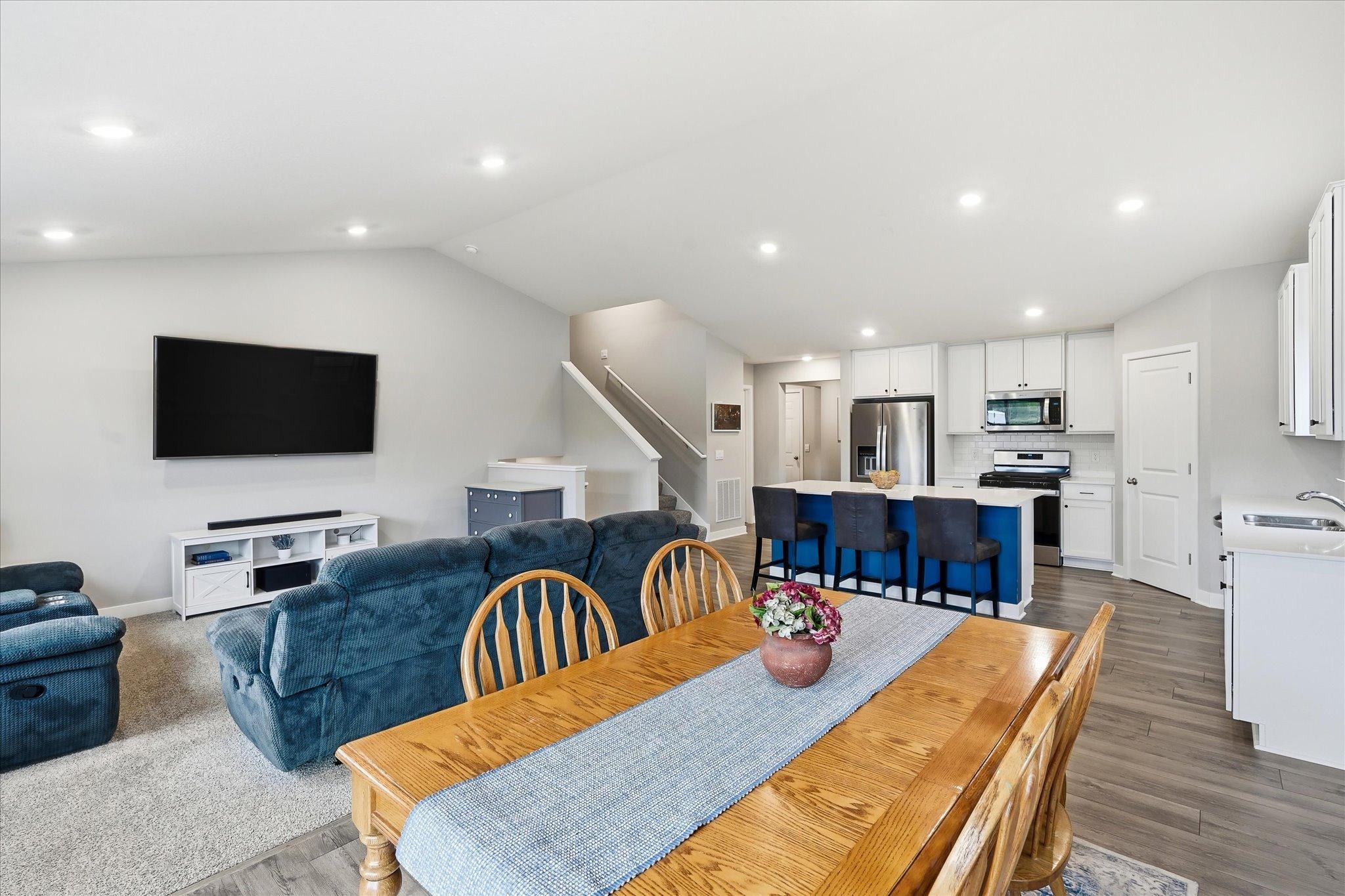 The open layout keeps everyone connected, whether preparing dinner or enjoying time around the table.