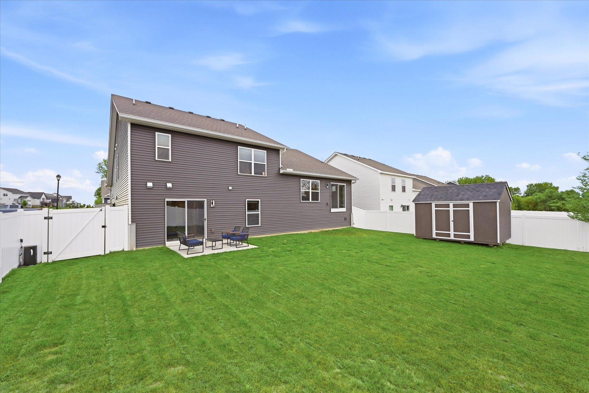 A storage shed added in 2026 provides extra room for lawn equipment, tools, and outdoor essentials.