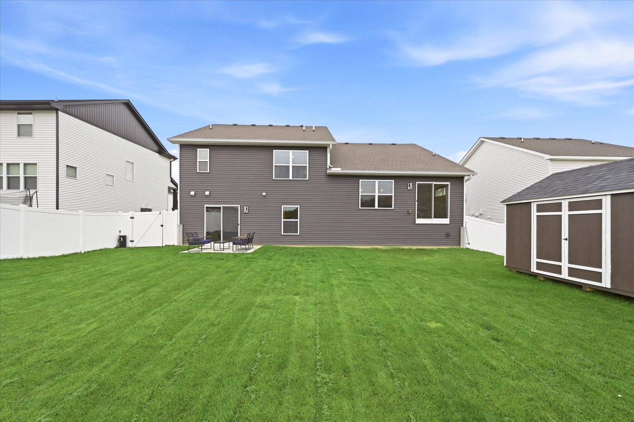 The fully fenced yard offers room to enjoy the outdoors in your own private space.