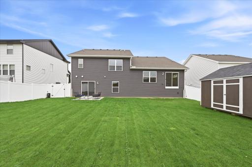The fully fenced yard offers room to enjoy the outdoors in your own private space.