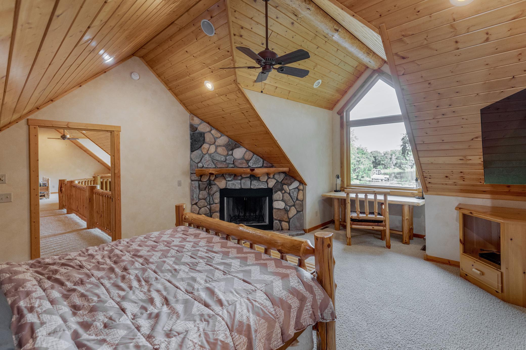 Wood Fireplace in Primary