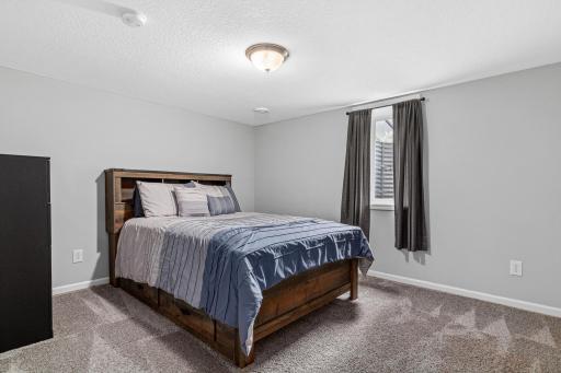 Basement bedroom is great for guests, teens or an office!