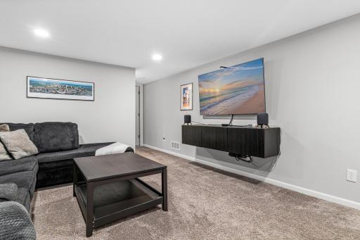View of family room toward hall leading to bedroom and bathroom.