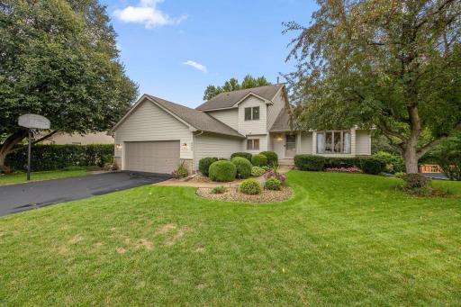 This modified 2-story lives large! 5 beds - 4 baths - extra large 2 car garage plus an abundance of storage space!