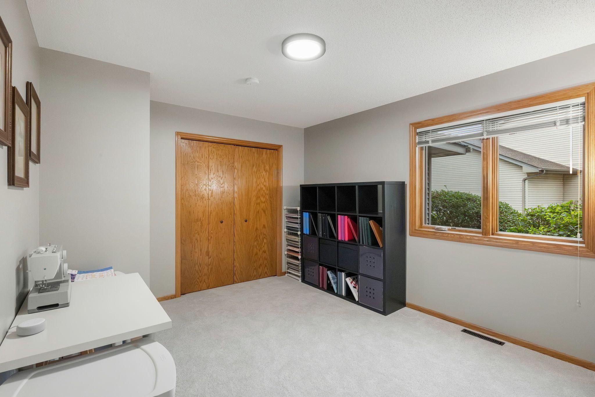 Main floor bedroom provides even more flexibility for guests, an office, or multi-generational living.