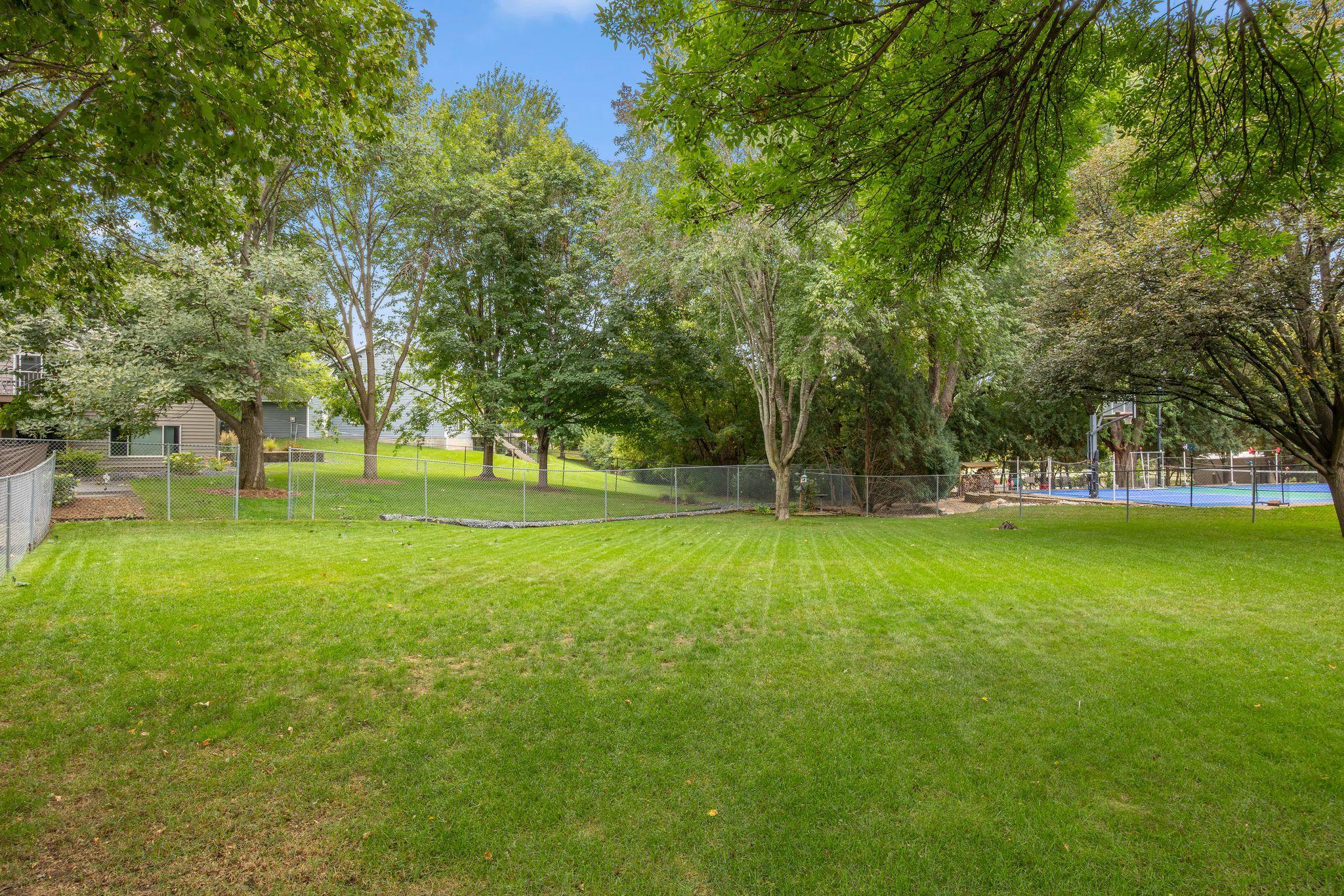 Expansive fully fenced backyard