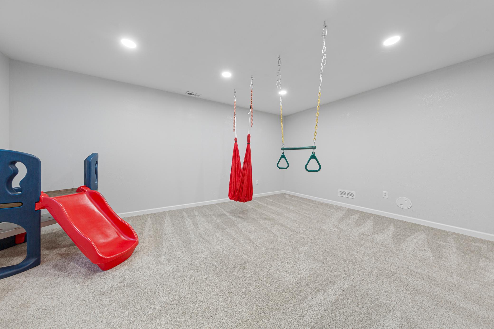 72_Flex room on lower level with bathroom rough-in (potential bedroom & bathroom space).jpg