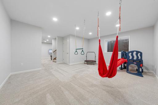 71_Flex room on lower level with bathroom rough-in (potential bedroom & bathroom space).jpg
