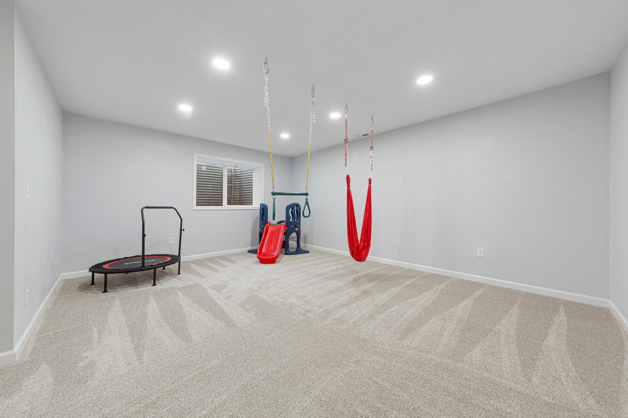 70_Flex room on lower level with bathroom rough-in (potential bedroom & bathroom space).jpg