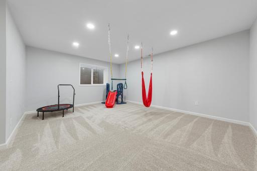 70_Flex room on lower level with bathroom rough-in (potential bedroom & bathroom space).jpg
