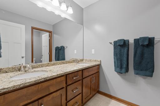 65_Upper Bathroom with double vanity and seprate toilet:shower area.jpg