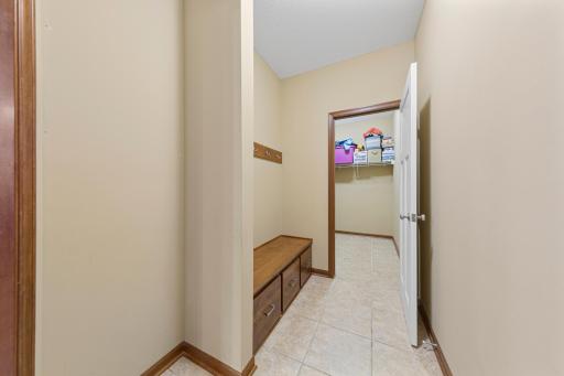 46_Mudroom built-in drop zone and large walk-in closet.jpg