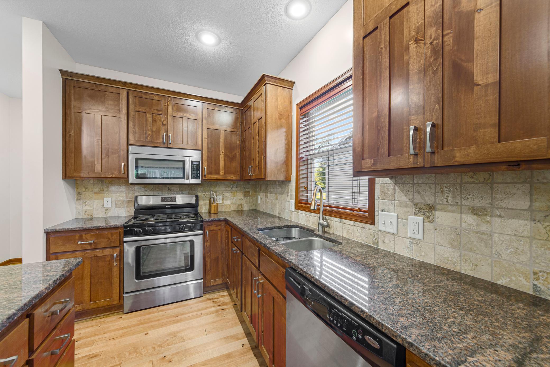 23_Kitchen sink window and gas stove.jpg