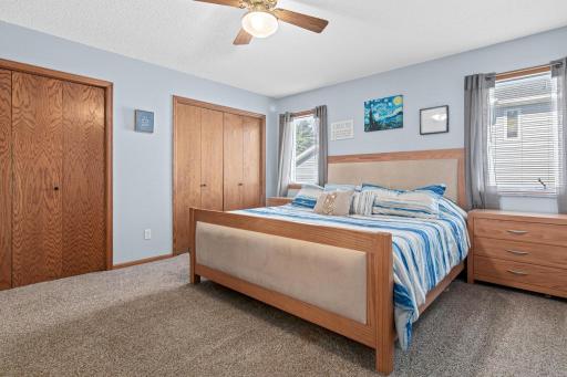 Upper level primary suite with two spacious closets