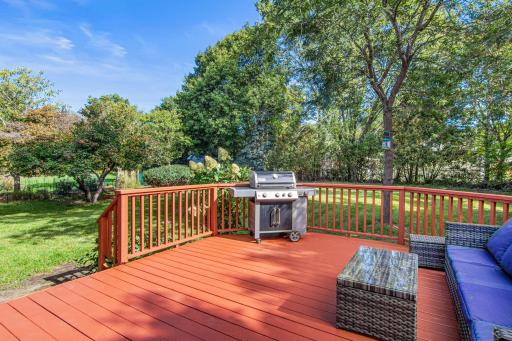 The deck off the dining area offers the perfect spot for morning coffee, grilling, or summer dinners.