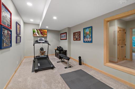 Owners added this multi purpose flex room with large windows, that is currently a workout area.