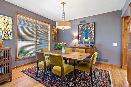 Expansive dining area open to the living room with built in server and storage are for all your dishes and serve ware.
