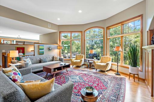 Lots of natural daylight with these huge picture windows overlooking trees and nature.