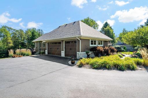 Heated garage and professional installation of insulation in garage attic and walls. Comes with an EV charger. Very neat and organized garage.