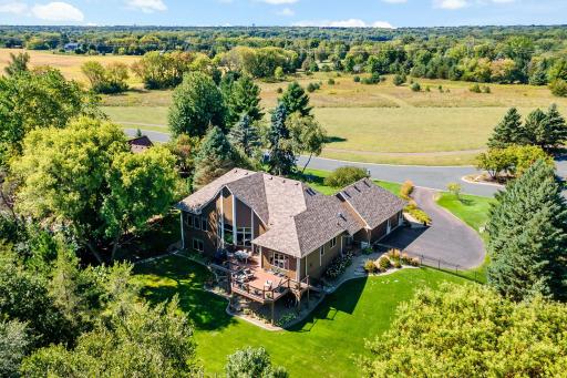 Surrounded by trees and trails. The home is located at the end of the culdesac. Beautiful views out every window.