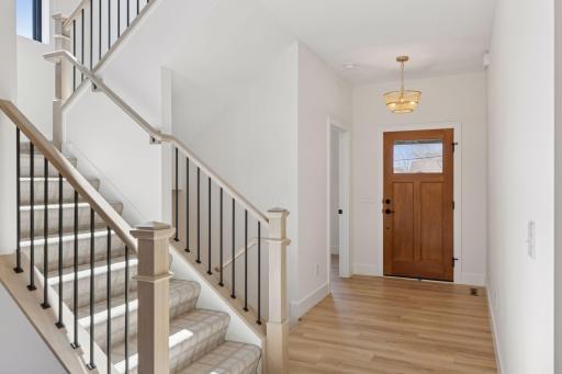 9' main level ceilings! Main level painted or stained newel post with wrought iron spindles! *Photos are from a prior model-Majority of shown options are included in the sales price.