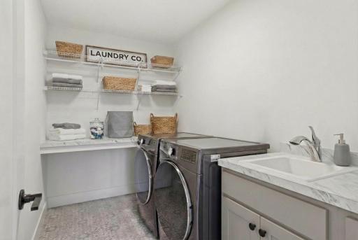 Enjoy convenient upper level laundry!*Photos are from a prior model-Majority of shown options are included in the sales price. Virtually staged to show design options.