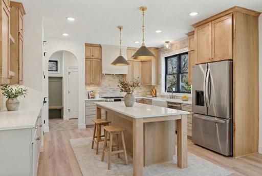 Enjoy low maintenance laminate flooring throughout the Kitchen, Dining, Living area! *Photos are from a prior model-Majority of shown options are included in the sales price. Virtually staged to show design options.