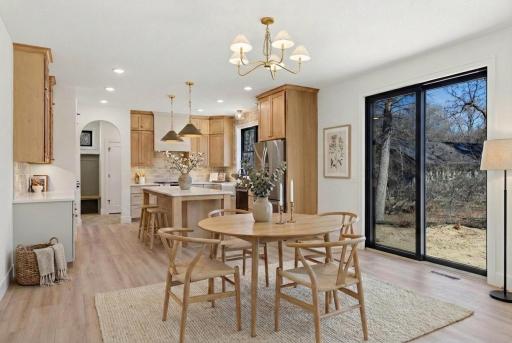 Stunning gourmet kitchen with stainless steel appliance and extended kitchen island with quartz countertops! *Photos are from a prior model-Majority of shown options are included in the sales price. Virtually staged to show design options.