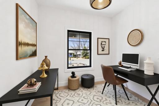 Private but sunny office space on the main level with closet space! *Photos are from a prior model-Majority of shown options are included in the sales price. Virtually staged to show design options.