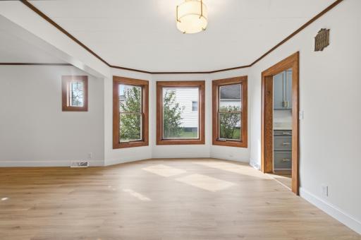 Dining area with windows allowing natural light
