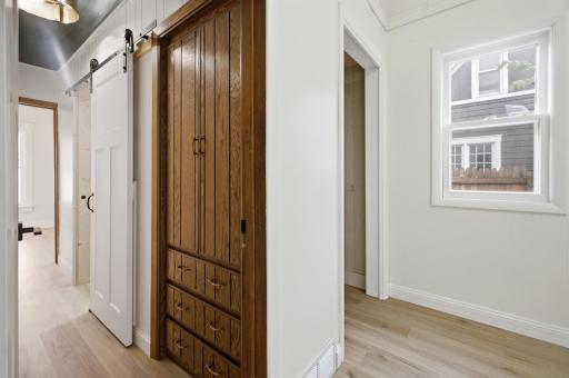 Main floor hallway with additional storage