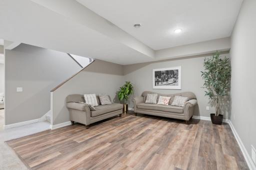 Basement space open for your ideas, work-out area, game area with beautiful LVP