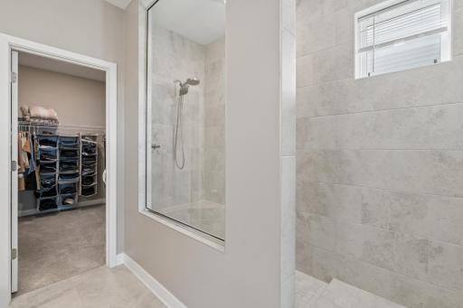 Luxury walk-in Tile Shower & Expansive Closet Space