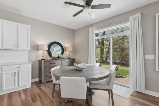 Sunny Dining Area Overlooking the Private Backyard