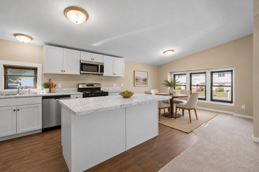 Large kitchen, plenty of storage and dining room (Virtually Staged)
