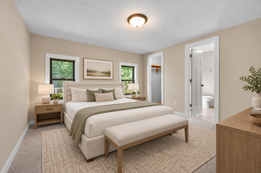 Primary bedroom with ensuite bath and walk in closet (Virtually Staged)