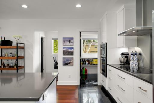 Adjacent walk-in pantry with large window