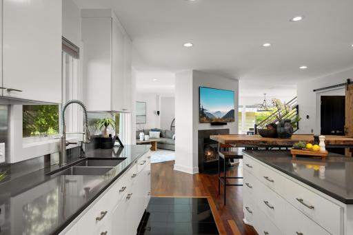 Kitchen with fireplace open to the great room