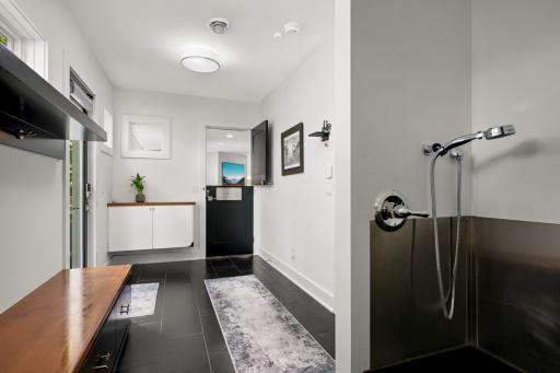 Mudroom with dog wash and Dutch door for the pooch. h room