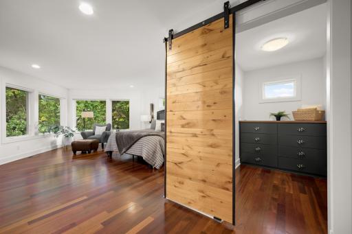 Barn door to the primary dressing area