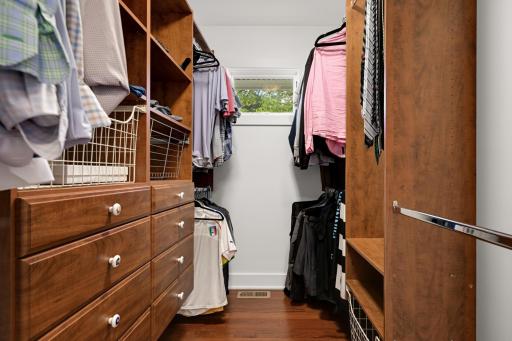 Primary custom closet organizers and window
