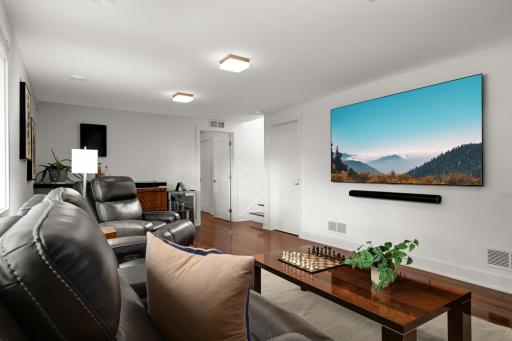 Walkout family room has a bar with 2 refrigerators