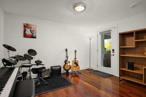 Wonderful office or exercise room with door to the deck
