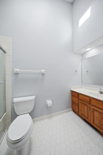 Shared full bathroom in the upper level.