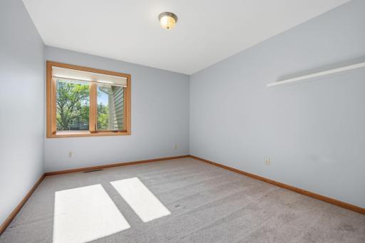 Upper level secondary bedroom.